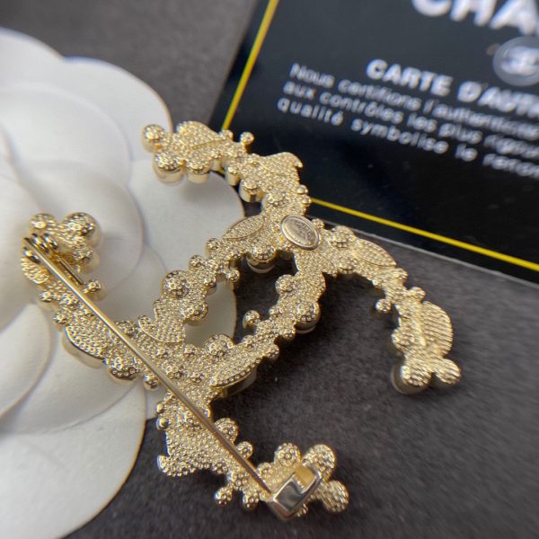 cc Brooch
