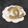 cc Brooch
