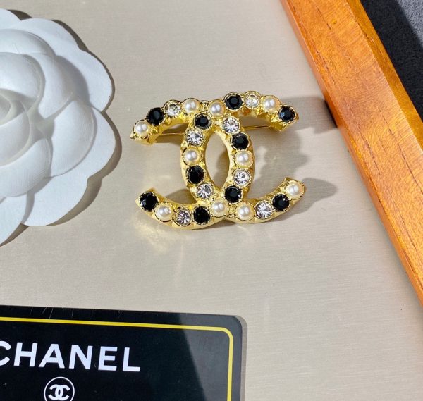 cc Brooch