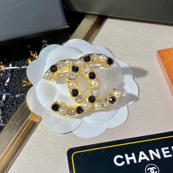 cc Brooch