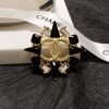 cc Brooch