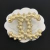 cc Brooch