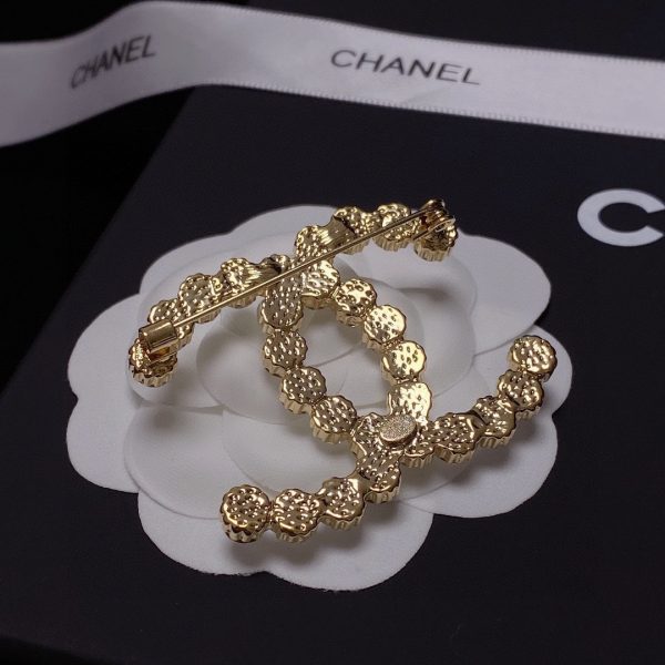 cc Brooch