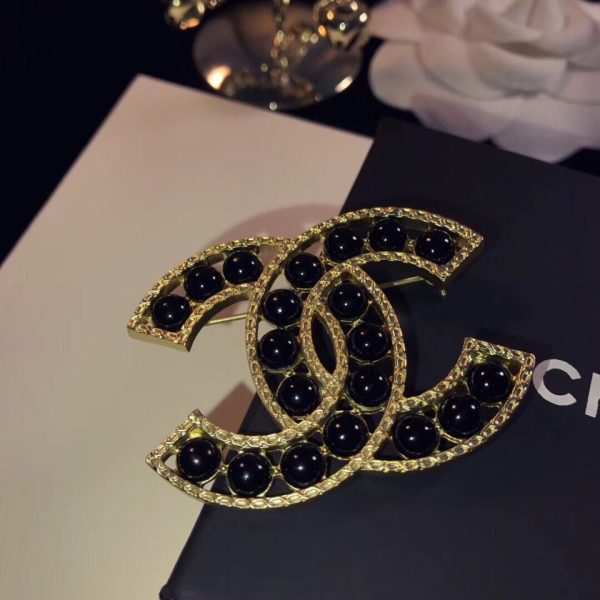 cc Brooch
