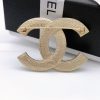 cc Brooch