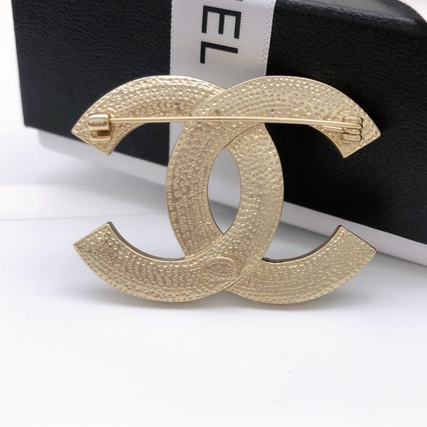 cc Brooch