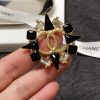 cc Brooch