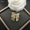 cc Brooch