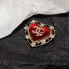 cc Brooch