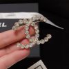 cc Brooch