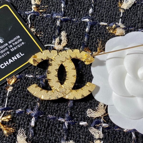 cc Brooch