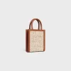 MINI VERTICAL CABAS CE IN TEXTILE WITH CE ALL-OVER PRINT NATURAL / TAN