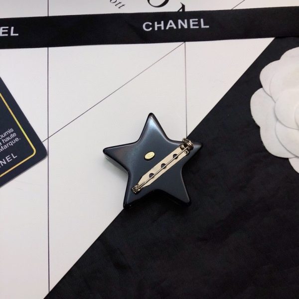 cc Brooch