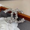 cc Brooch