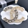cc Brooch