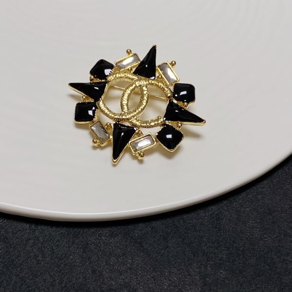 cc Brooch