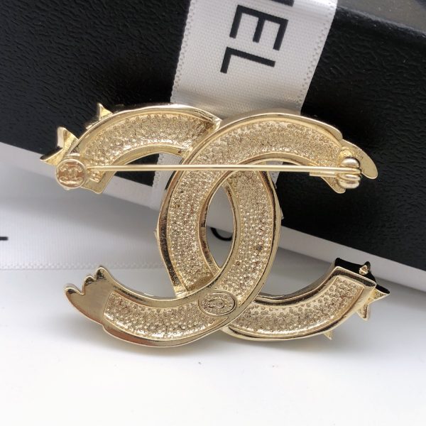 cc Brooch