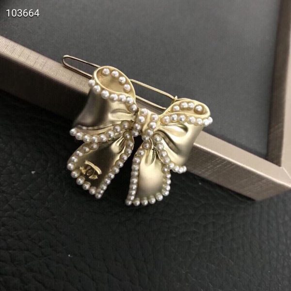 cc Brooch