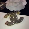 cc Brooch