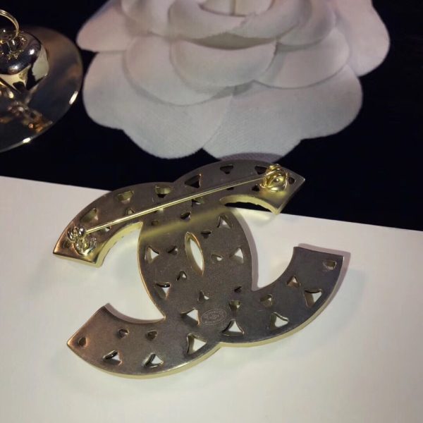 cc Brooch