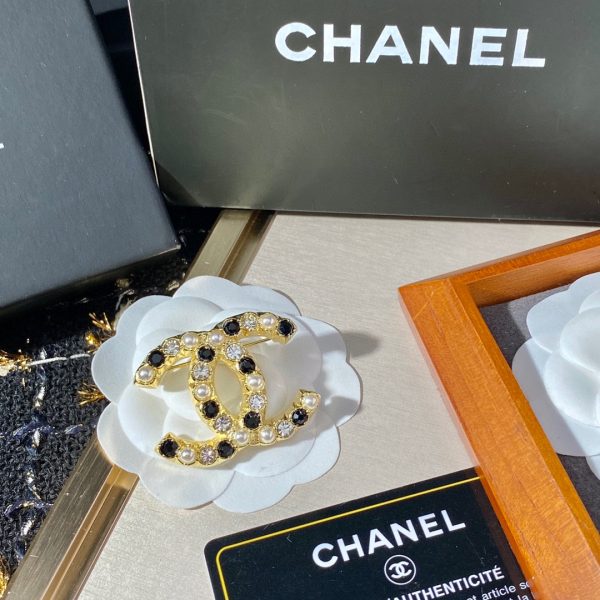cc Brooch