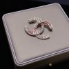 cc Brooch
