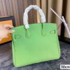 Her birkin new arrival bag green