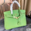 Her birkin new arrival bag green