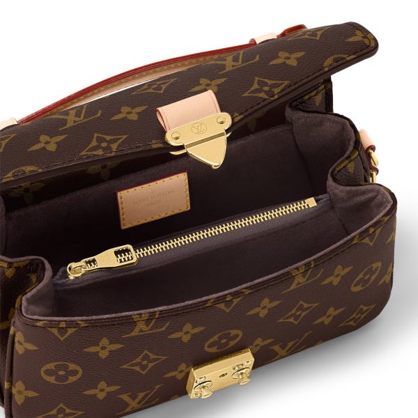 L M46279 Pochette Metis East West